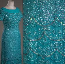 Платья Нормана Хартнелла для Ее Величества.