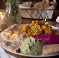 Where to eat brunch in nyc this spring. Kashkaval Garden Hell S Kitchen Nyc