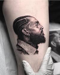 He admits that he already needs to get the piece touched up. Nipsey Hussle Portrait Tattoo Portrait Tattoo Body Art Tattoos Tattoo Graphic