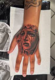 Saint Mary Hand Tattoo