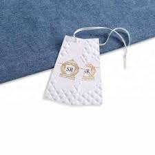 We have printed and embroidered options available to make your brand or business logo stand out. China Custom Swing Tags Garment Hang Tags For Clothing