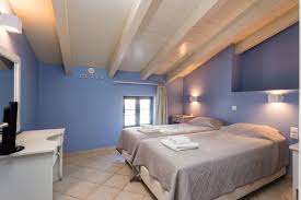 Open gourmet kitchen with stainless appliances. Two Bedroom Suite Sea View Palazzo Greco Hotel