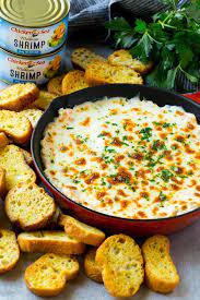 A Creamy Shrimp Scampi Dip Served With Croutons Shrimp Scampi Dip Favorite Shrimp Recipes Dip Recipes Hot