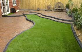 Artificial Grass In A Garden Landscape Designs For Your Home Best Artificial Grass Laying Artificial Grass Turf Installation