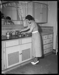jean wilson fills a pot with water at a