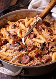 Creamy Cajun Chicken And Sausage Pasta Recipe Yummly Recipe Sausage Pasta Recipes Cajun Chicken And Sausage Pasta Recipe Pasta Dishes