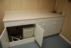 Laundry Room With Hidden Sump Pump Basement Makeover Laundry Room Remodel Basement Inspiration