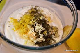 Place shredded lettuce on the tortilla. Greek Fish Tacos With Cucumber Salsa And Garlic Yogurt Sauce