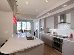 Discover how much your dream kitchen will cost with our fantastic price estimator tool. 10 Fantastic Space Saving Galley Kitchen Ideas Whitegalleykitchens Modern White Galley Kitchen Recessed Lighting Kitchen Remodel Layout Galley Kitchen Design