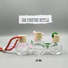 Perfume bottles comprised of hand made gilded brass with ornate and intricate filigree designs surrounding cut crystal glass. Botol Perfume Kereta Botol Kosong Shopee Malaysia
