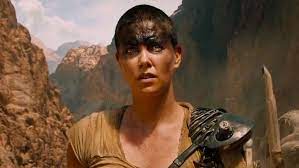 Charlize theron as furiosa in mad max: Mad Max Fury Road Prequel Seeks New Actress For Furiosa Nerdist