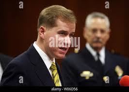 Missouri Gov. Matt Blunt (C) and State Rep. Bob Behnen (R) listen as Dr.  Roger Beachy, president of the Donald Danforth Plant Science Center talk  about new legislation that requires gasoline sold