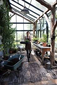 This simple indoor greenhouse is right for a small space, it's built of wood and there are some containers for growing. Greenhouse Benches Ideas On Foter