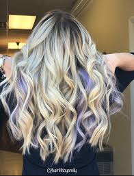 Feather in some purple peek a boo highlights to compliment your platinum blonde hair color. Balayage With Lavender Peekaboo Peekaboo Hair Peekaboo Hair Colors Lavender Hair