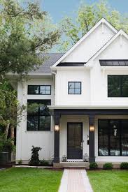 If you haven't seen the complete house tour, you also, love the wood shutters and the swing. Modern White Farmhouse Exterior Ideas Pickled Barrel White Exterior Houses White Farmhouse Exterior Modern Farmhouse Exterior