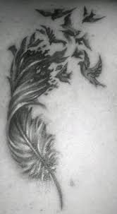 Birds Of A Feather Saying A Beautiful Black And White Tattoo Of A Feather Dissolving Into A Flock Of Birds Feather Tattoos Tattoos Feather Tattoo Design