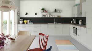 Photo of a contemporary kitchen in london with a submerged sink, shaker cabinets, grey cabinets, stainless steel appliances, a breakfast bar, grey floors and white worktops. Ready To Fit Grey Kitchen Orlando Wickes