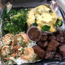 Chefgod On Instagram Surf N Turf Steak Shrimp Scampi Over Rice Broccoli Cheddar Baked Potato And Fresh Seasoned Bro Food Food Lover Soul Food