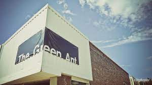 We sat in oversized hot pink chairs from the 80's or 90's that came from a prop house in los angeles. The Green Ant Vintage Mid Century Modern Furniture