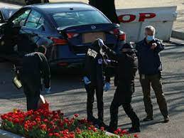 The driver was then shot by police and died later in hospital. B4jgve7u Ez5m