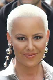 Her original name is amber levonchuck.she remained wife with wiz khalifa for just a year time 2013 to 2014 and she has one son named sebastian taylor thomaz. Amber Rose Straight Silver Buzz Cut Hairstyle Steal Her Style