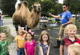 Our facility will open soon traveling animal shows and petting zoo! Students From St John S Lutheran School Check Out Petting Zoo At Independence Village Midland Daily News