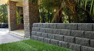 Pavestone 10 red retaining wall block showcases a textured face that is the perfect complement to any landscape design. Adbri Masonry Windsor Stone 295x203x130mm Retaining Wall Block Bricks Blocks Pavers Online