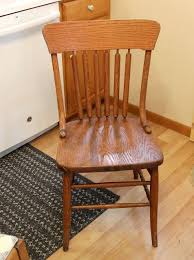 A Garage Sale Dining Chair Upcycle With Pillow Upcycle Chair Wooden Chair Makeover Dining Chairs
