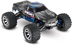Rc car action this scatter gun is a blast reader's ride rc car action carbon copy clod reader's ride rc car action big blue makeover reader's ride rc car action traxxas. Amazon Com Traxxas Revo 3 3 1 10 Scale 4wd Nitro Powered Monster Truck With Tqi 2 4ghz Radio Tsm Blue Toys Games