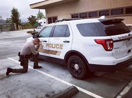 The San Bernardino County Sheriff S Department Is Under Scrutiny For Posting A Photo Of A Deputy Praying B County Sheriffs San Bernardino County San Bernardino