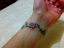 Flowers are another popular choice for wristband tattoos, especially among women. 80 Fantastic Dainty Tattoos On Wrist