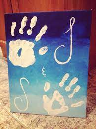 Using A Canvas Board I Took A Damp Sponge And Started With A Dark Blue Paint Mixing It With Canvas Painting Diy Couples Canvas Painting Cute Canvas Paintings