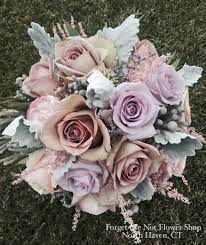 Bridesmaid Bouquet With Muted Colors Including Roses Silver Brunia Astilbe And Dusty Miller By Forget Me N Flowers Wedding Flowers Same Day Flower Delivery
