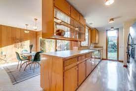 The formica countertop a midcentury staple has a sturdy aluminum edge that prevents chipping and scratching. 12 Mid Century Kitchen Design Essentials Home
