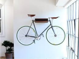 10 Ways To Hang Your Bike On The Wall Like A Work Of Art Indoor Bike Storage Bike Storage Shelf Indoor Bike Rack