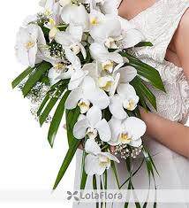 This untamed bouquet of anemones, scabiosa, white peonies, and greenery by cherries flowers is simply stunning. How To Save Money With Cheap Flower Ideas For Weddings