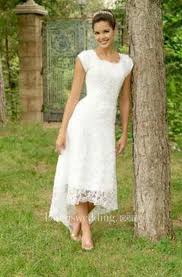 High Low U Neck Cap Sleeves Modest Elegant Lace Wedding Dress Dorris Wedding With Images Wedding Dresses High Low White Bridal Gown Tea Length Wedding Dress