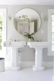 Bathrooms Gray Bathroom Double White Pedestal Sinks Round Bathroom Mirror Chrome Fixtures Penny Tile Round Mirror Bathroom Elegant Bathroom Timeless Bathroom