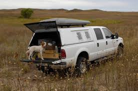 The camper is covered with fabric and paint, otherwise known as poor man's the truck capacity is 1000 pounds and the camper weighs less that 400. The Power To Sleep Stay Warm And Make Coffee In A Truck Camper Shell