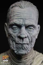 This is a promotional photo for the 1957 film Voodoo Island, starring Boris  Karloff. The image depicts a skeleton sitting at a control panel, and the  text "VUL-74" is likely a production