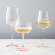 Esme Glassware Each one of estelle colored glasses is hand blown by glass artisans in poland and bring irid… west elm