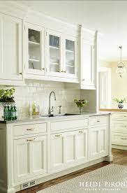 Cream kitchen cabinets offer a warm feel and elegant look in any cooking area. Cream Kitchen Using Cream Glass Subway White Kitchen Design Kitchen Cabinet Design Off White Kitchen Cabinets