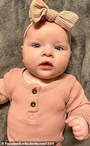 Dramatic moment cops rescue baby from second story of burning home