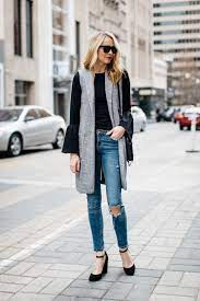 Fall Outfit Winter Outfit Long Grey Vest Black Bell Sleeve Top Chloe Faye Handbag Denim Ripped Skinny Jeans Black Ankle Strap Kleidung Winterkleid Outfit