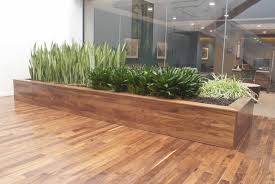 The monsoon planter is a striking rethink of the standard window box in an audaciously modern package that takes on a decidedly different look in each finish. Corporate Interior Landscaping Services Engledow Group Contemporary Planters Indoor Planters Garden Planter Boxes