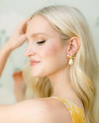 Golden Bow and Pearl Drop Earrings