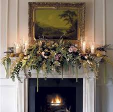 Elegant Different Christmas Mantel Decorated With Greens Roses Other Flowers Ca Christmas Mantel Decorations Christmas Fireplace Decor Christmas Mantle