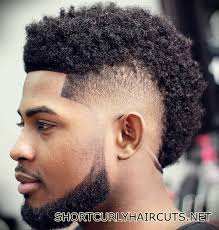 While faded sides can make curly hair easier to wear, these short sides reveal some texture while this short textured cut is one of the most popular hairstyles for men. Best Short Curly Haircuts For Men