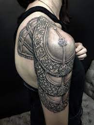 I Like This One All Around I Like How It Goes Part Way Onto The Back I M Just Not As Sure About How I C Armor Tattoo Shoulder Armor Tattoo Half
