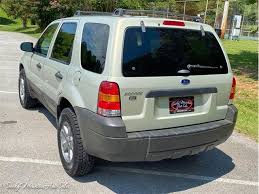 Image result for Gold Ash 2005 Escape